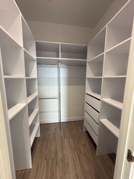 Modern Walk In Closet with Open Shelving Drawers and Clothing Storage