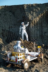 Exploration of the moon with astronauts and a lunar rover during a bright day © Kokhan O
