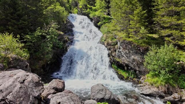 Nature wildness. Rapid waterfall travel destination. Picturesque waterfall. Travel destination. Scenery waterfall route. Nature mountain landscape. Waterfall landscape. Roaring cascade