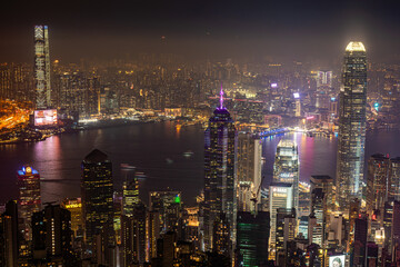 Fototapeta premium Detailed photo of Hong Kong and Kowloon Skyline as seen from the Victoria,Peak, Hong Kong Island, SAR hong Kong, China, Skyscrapers in the night skyline. 