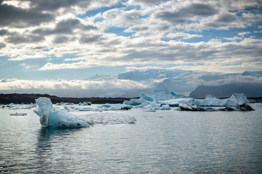 Ice floes drifting in a calm glacier lagoon