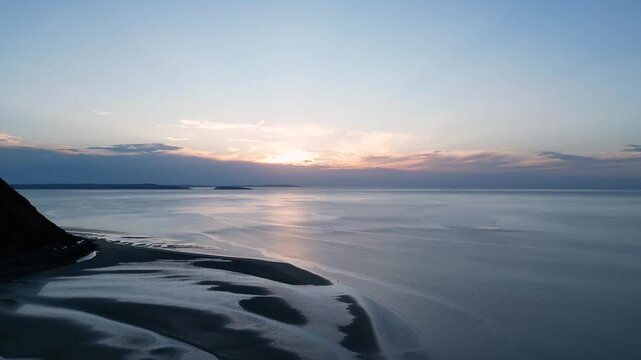 Low tide sunset over Conwy bay, north Wales.