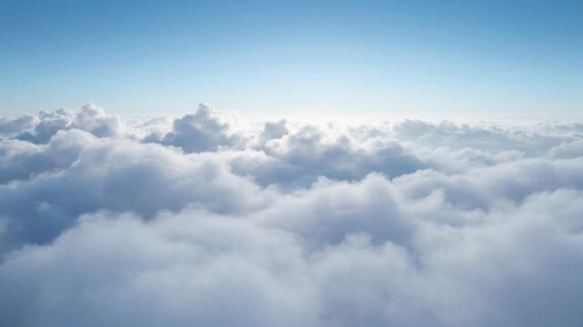 Aerial View Of Fluffy White Clouds Floating In Bright Blue Sky From Above Video clip