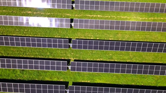 Smooth Flight Above Modern Solar Power Plant In Virginia Showcasing Renewable Energy Infrastructure 4K
