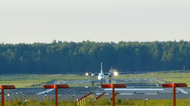 Airplane fokker f50 turboprop commercial passenger aircraft taking off from airport runway into sky in 4K Ultra HD footage
