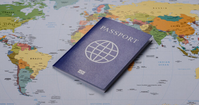International passport against a map backdrop, concepts of travel. Passport on a map