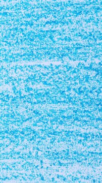 Scribbles and rubbing marks made with a blue wax