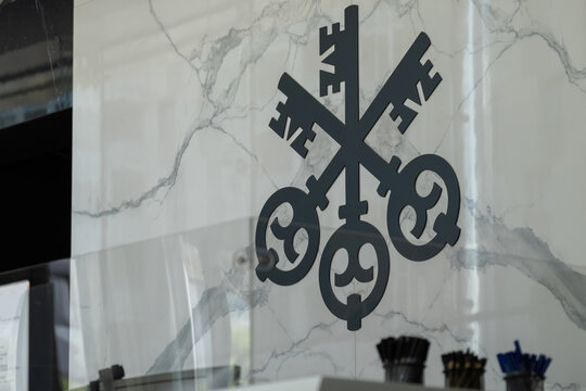 UBS logo displayed inside modern office building with marble interior wall