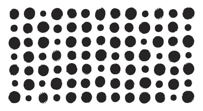 Collection of various hand drawn black ink circles and dots arranged in a grid pattern on a white background with irregular edges and textured brush strokes