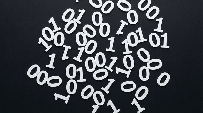 Overhead Binary Code Rain on Matte Black Surface. Minimalist flat lay of scattered white binary digits on sleek matte black background, modern typography meets technology design