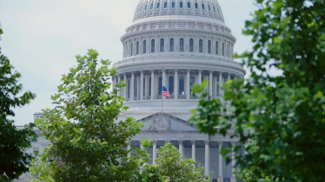US Capitol Building with Flag at Half Mast