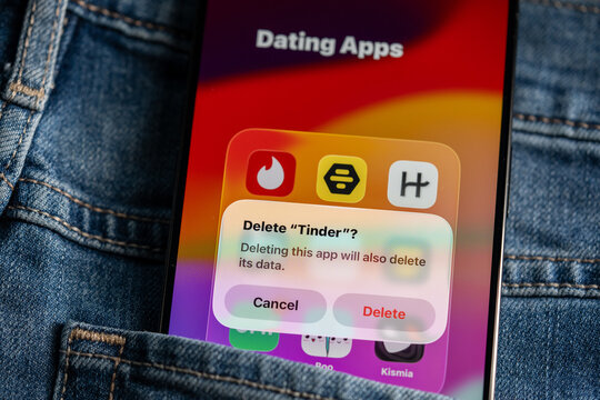 Delete Tinder dating app confirmation on smartphone screen. Toronto, Canada - July 24, 2026.