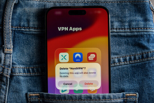 Delete NordVPN app confirmation on smartphone screen. Toronto, Canada - July 24, 2026.