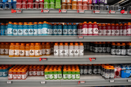 View of Gatorade and Powerade sports drinks on store shelves. Toronto, Canada - July 24, 2026.