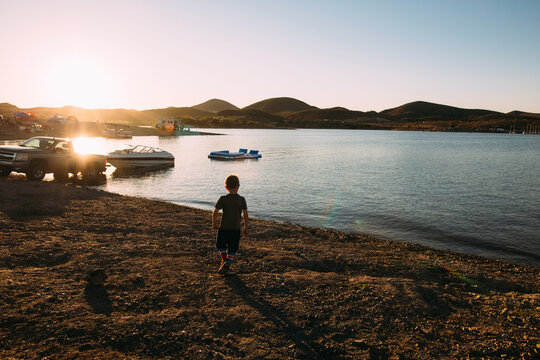 Boy Playing By Arizona Lake