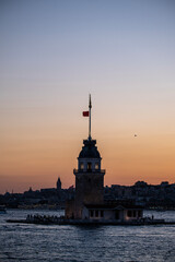 Fototapeta premium Tower Silhouette at Sunset on the Bosphorus. Golden Sunset Over the Bosphorus with Maiden's Tower.
