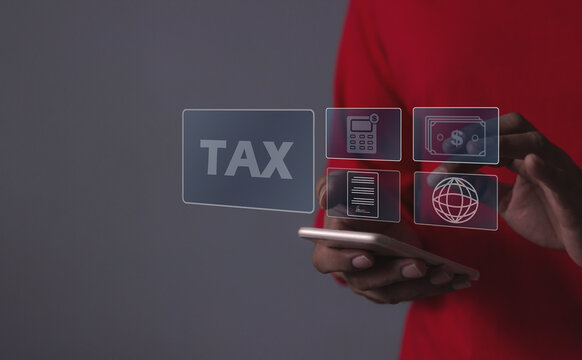 Young man uses smartphone to file taxes online, Tax online, Tax Time, Offers online tax refund forms for paying taxes, Signing taxes online