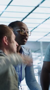 IT team addresses computer crash inside a server farm, linking professional response, support escalation and infrastructure risk from camera A angle.