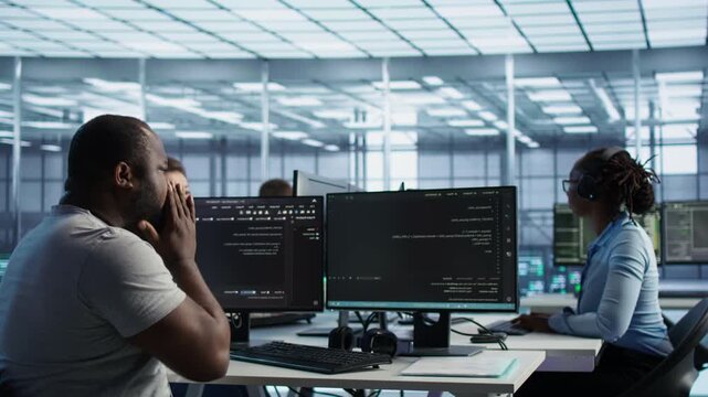 Admin operating in data center suffering from cold, sneezing from a secondary camera angle while highlighting data protection, network security and infrastructure risk.