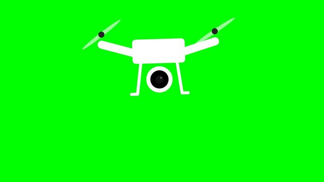 White drone with camera hovering on green screen background.
