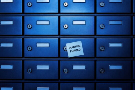 Blue mailboxes with inactive purged notice and locked compartments