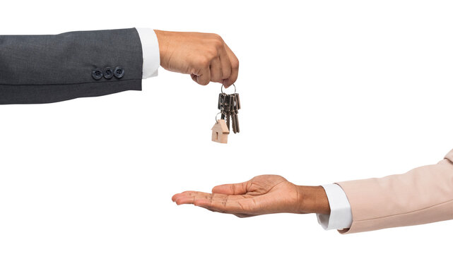 business hand giving keys isolated on white