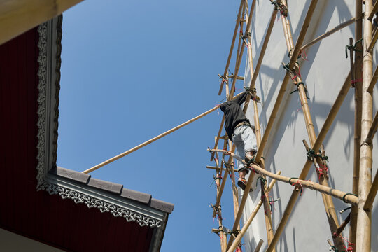 Working at heights, The workers are repairing the house, painted