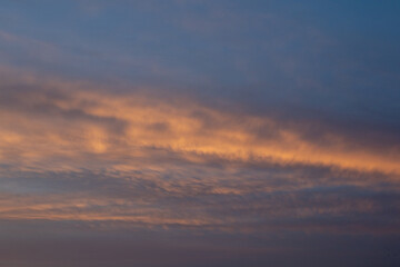 Obraz premium Sunset Clouds With Orange Hues