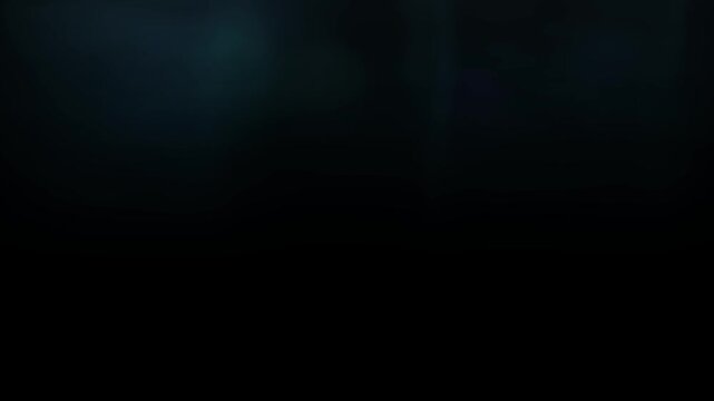 Seamless looping background of dark abstract gradients and soft lighting.