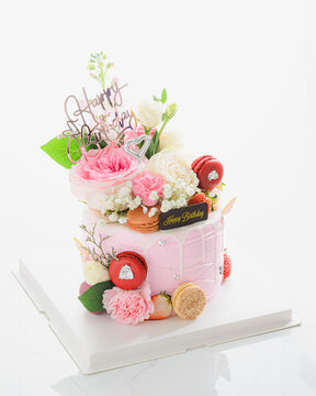 bouquet of roses on birthday cake