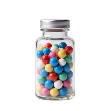 Colorful gumballs are piled high in a clear glass jar with a silver lid
