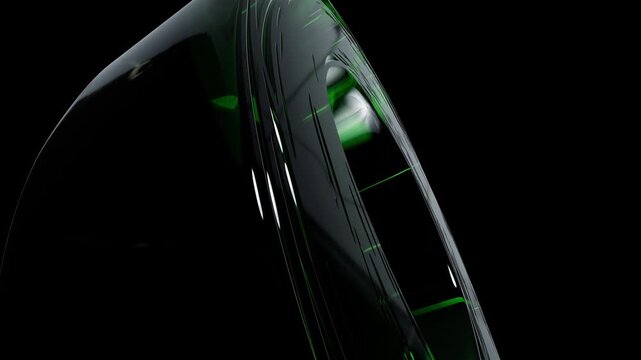 Abstract dark green curved shape with smooth glossy surface and light reflections isolated on a black background for modern digital design graphics