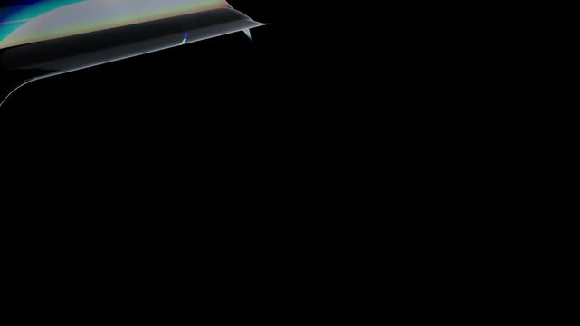 Abstract rainbow light refraction on a smooth glossy surface with a dark background