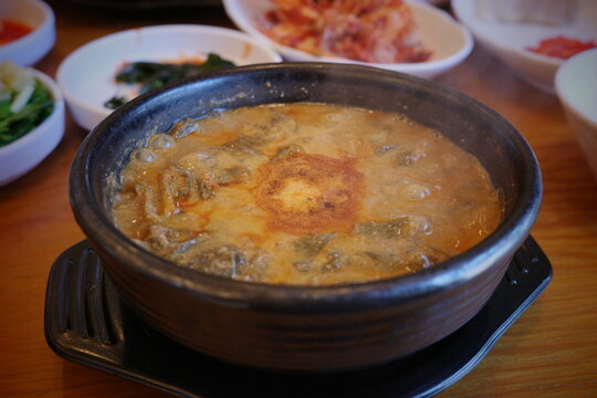 Loach Soup Served in a Black Earthenware Bowl