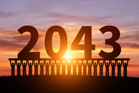 Numerous small figures silhouette in the morning sun, holding 2043