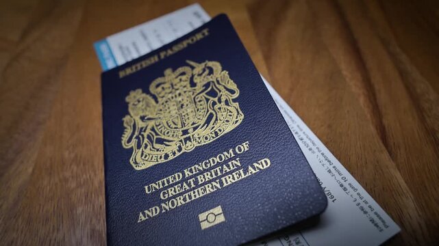 United Kingdom Passport With Boarding Pass Symbolizing International Travel