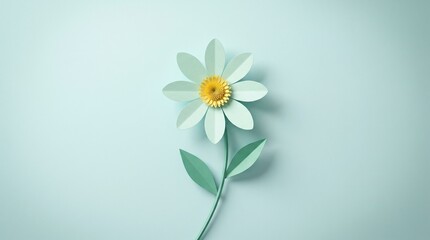 Obraz premium Minimalist paper cut flower craft on light blue background with copy space