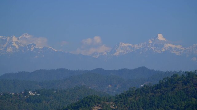Panoramic View of Snow Capped Trishul Mountain Peak and Himalayan Range from Kasar Devi Almora Uttarakhand India