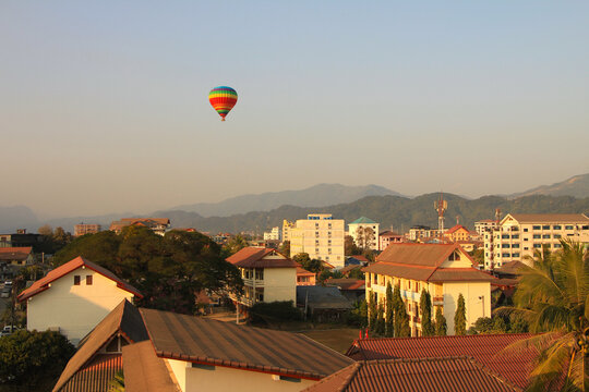 Sunset View of Vang Vieng with Hot Air Balloons in the Sky, Laos
