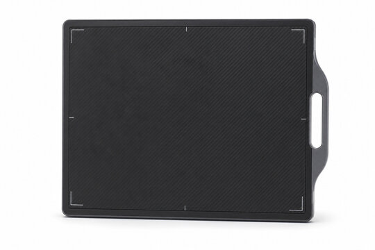 Generative AI isolated medical product image of computed radiography imaging cassette on a pure white background. Clean radiology equipment for healthcare, diagnostic technology and commercial design.