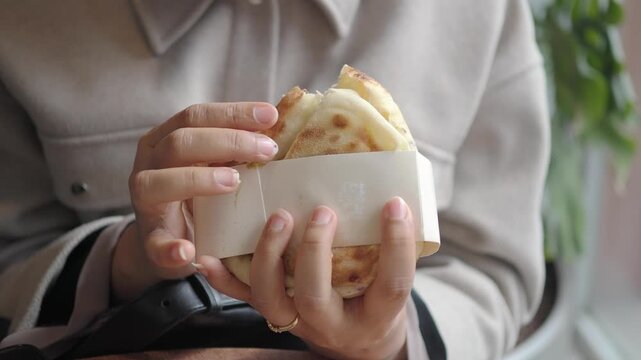 Enjoying a tasty snack at a local cafe in the morning