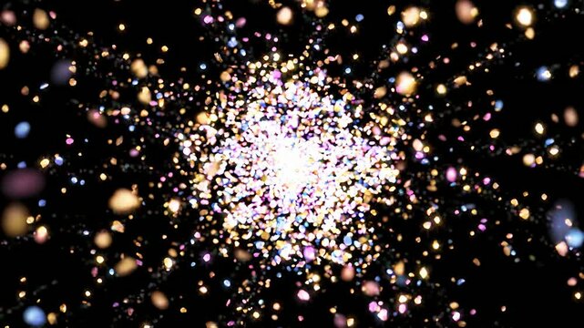 黒背景に舞い集まる金色の光の粒子
