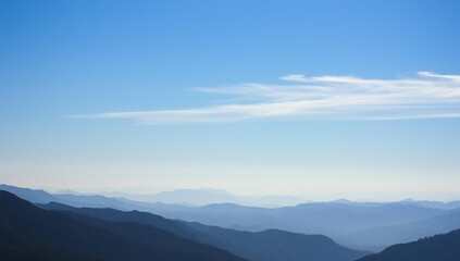Fototapeta premium Serene mountain range under clear sky