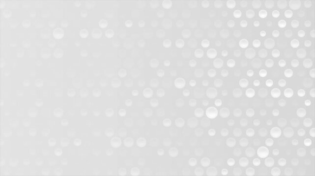 White and grey minimal glass halftone circles abstract geometric background. Technology motion design. Seamless loop. Video animation Ultra HD 4K 3840x2160