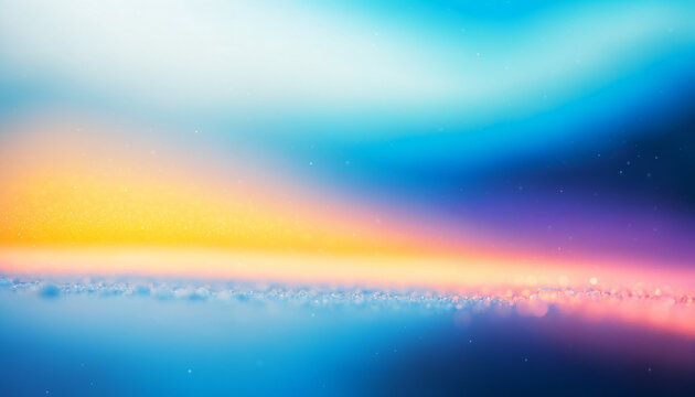 soft focus frosty snow surface under colorful gradient sky of yellow orange blue and purple with floating particles