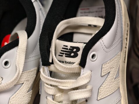 Stockholm, Sweden-Nov.28th 2025: New Balance brand logo on shoe product