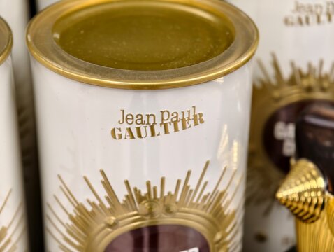 Stockholm, Sweden-Nov.28th 2025: Jean Paul Gaultier perfume gold and white tin packaging on display.