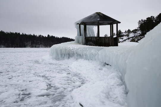 Impressive ice formations cover a wooden pavilion on the shore of Sweden&rsquo;s Lake V&auml;nern&mdash;created by freezing spray and waves during a fierce Scandinavian winter storm near &Aring;m&aring;l.