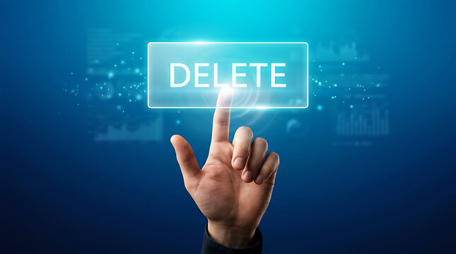 Hand pressing delete key on glowing digital interface finger