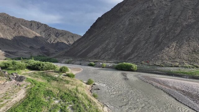 A picturesque landscape featuring the Chilik River in the mountains of the Almaty Region, southeastern Kazakhstan.	